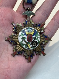 A Chinese 'Order of Extreme Bravery' medal (Order of the Golden Lion), inscribed Chi Dan 赤膽, Republic