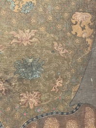 Chinese school: 'Deity and foo dog', ink and colour on silk, 16/17th C.