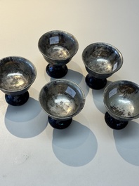 Five Chinese silver-lined laque burgaut&eacute; stem cups and a bowl, 18th C.