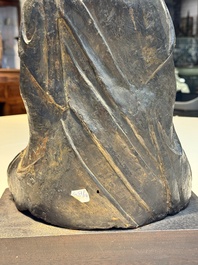 A large Chinese bronze Bodhisattva on wooden stand, Ming