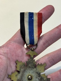 A Chinese 'Order of Extreme Bravery' medal (Order of the Golden Lion), inscribed Chi Dan 赤膽, Republic
