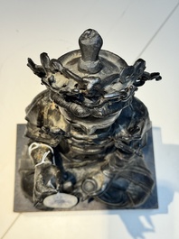 A large Chinese bronze Bodhisattva on wooden stand, Ming