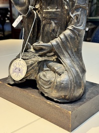 A large Chinese bronze Bodhisattva on wooden stand, Ming