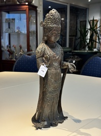 A fine and large Chinese bronze standing Buddha, Liao/Jin