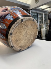 A large Chinese European-decorated blue and white fish bowl with narrative design, on a later wooden stand, Kangxi