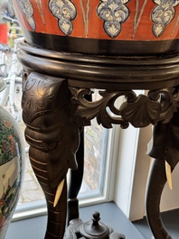A large Chinese European-decorated blue and white fish bowl with narrative design, on a later wooden stand, Kangxi