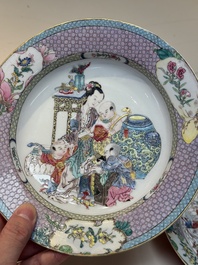 An extremely fine pair of Chinese famille rose ruby-back eggshell plates with a lady and playing boys, Yongzheng