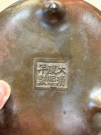 A Chinese bronze tripod censer, Kangxi mark and of the period
