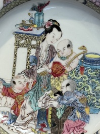 An extremely fine pair of Chinese famille rose ruby-back eggshell plates with a lady and playing boys, Yongzheng