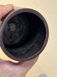 A Chinese bronze cylindric tripod censer, Guiyou 癸酉 mark, 17/18th C.