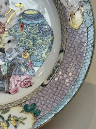 An extremely fine pair of Chinese famille rose ruby-back eggshell plates with a lady and playing boys, Yongzheng