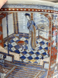 A large Chinese European-decorated blue and white fish bowl with narrative design, on a later wooden stand, Kangxi