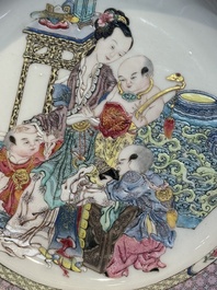 An extremely fine pair of Chinese famille rose ruby-back eggshell plates with a lady and playing boys, Yongzheng