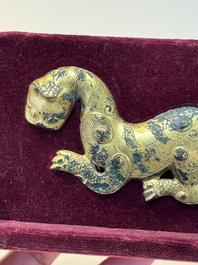 A rare Chinese gilt-bronze 'tiger' ornament, Han