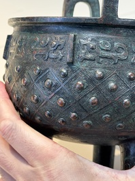 A Chinese archaic bronze ritual tripod food vessel, 'ding 鼎', Western Zhou