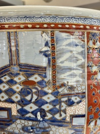 A large Chinese European-decorated blue and white fish bowl with narrative design, on a later wooden stand, Kangxi