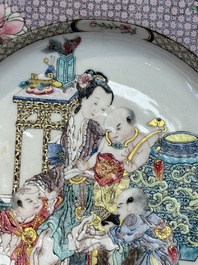 An extremely fine pair of Chinese famille rose ruby-back eggshell plates with a lady and playing boys, Yongzheng