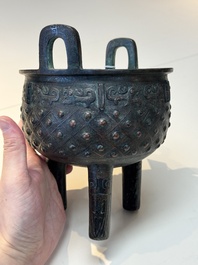 A Chinese archaic bronze ritual tripod food vessel, 'ding 鼎', Western Zhou