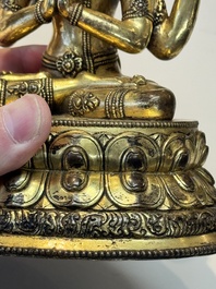 A fine Sino-Tibetan gilt-bronze Buddha, 17/18th C.