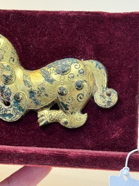 A rare Chinese gilt-bronze 'tiger' ornament, Han
