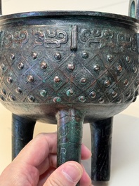 A Chinese archaic bronze ritual tripod food vessel, 'ding 鼎', Western Zhou