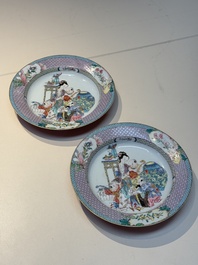 An extremely fine pair of Chinese famille rose ruby-back eggshell plates with a lady and playing boys, Yongzheng