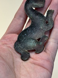 A rare Chinese gilt-bronze 'tiger' ornament, Han