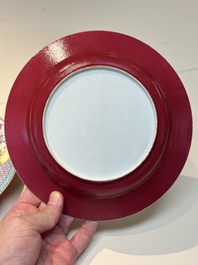 An extremely fine pair of Chinese famille rose ruby-back eggshell plates with a lady and playing boys, Yongzheng