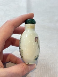 A diverse group of 12 Chinese snuff bottles and three covered seal paste boxes, Qianlong and Daoguang marks, 19th C.