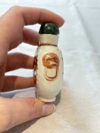 A diverse group of 12 Chinese snuff bottles and three covered seal paste boxes, Qianlong and Daoguang marks, 19th C.
