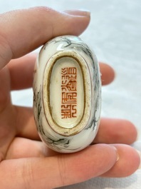 A diverse group of 12 Chinese snuff bottles and three covered seal paste boxes, Qianlong and Daoguang marks, 19th C.