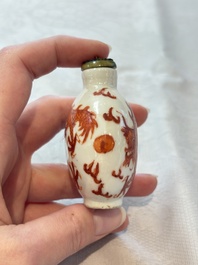 A diverse group of 12 Chinese snuff bottles and three covered seal paste boxes, Qianlong and Daoguang marks, 19th C.