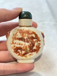 A diverse group of 12 Chinese snuff bottles and three covered seal paste boxes, Qianlong and Daoguang marks, 19th C.