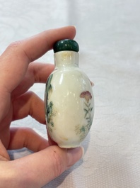A diverse group of 12 Chinese snuff bottles and three covered seal paste boxes, Qianlong and Daoguang marks, 19th C.