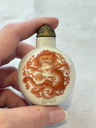 A diverse group of 12 Chinese snuff bottles and three covered seal paste boxes, Qianlong and Daoguang marks, 19th C.