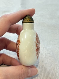 A diverse group of 12 Chinese snuff bottles and three covered seal paste boxes, Qianlong and Daoguang marks, 19th C.