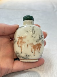 A diverse group of 12 Chinese snuff bottles and three covered seal paste boxes, Qianlong and Daoguang marks, 19th C.