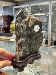 A Chinese Lingbi stone scholar's rock on wooden stand, Yun Tai 雲台 mark, 19/20th C.