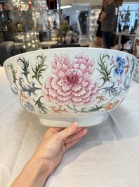 An unusual Chinese famille rose punch bowl with floral relief design, Qianlong