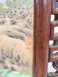 A Chinese famille rose 'gathering of sages' plaque, mounted in a wooden frame, Republic
