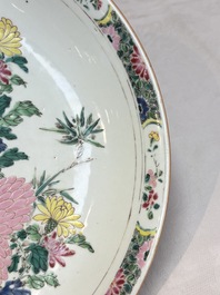 A Chinese famille rose 'butterfly among flowers' dish, Yongzheng