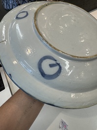 Three blue and white Dutch Delft chinoiserie dishes, late 17th C.
