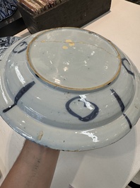 Three blue and white Dutch Delft chinoiserie dishes, late 17th C.