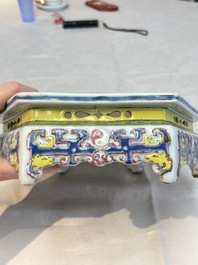 A Chinese famille rose hexagonal stand with antiquities, Yongzheng/Qianlong