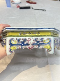 A Chinese famille rose hexagonal stand with antiquities, Yongzheng/Qianlong