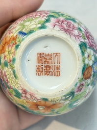 A pair of Chinese famille rose 'millefleurs' cups with a presentation box, Jiaqing mark, Republic