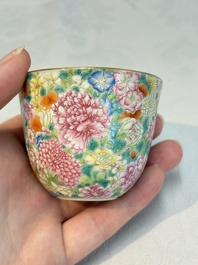 A pair of Chinese famille rose 'millefleurs' cups with a presentation box, Jiaqing mark, Republic