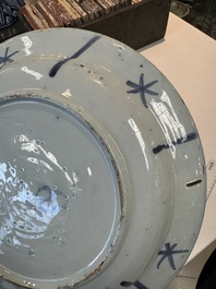 Three blue and white Dutch Delft chinoiserie dishes, late 17th C.