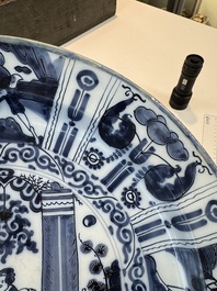 Three blue and white Dutch Delft chinoiserie dishes, late 17th C.