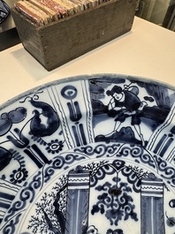 Three blue and white Dutch Delft chinoiserie dishes, late 17th C.